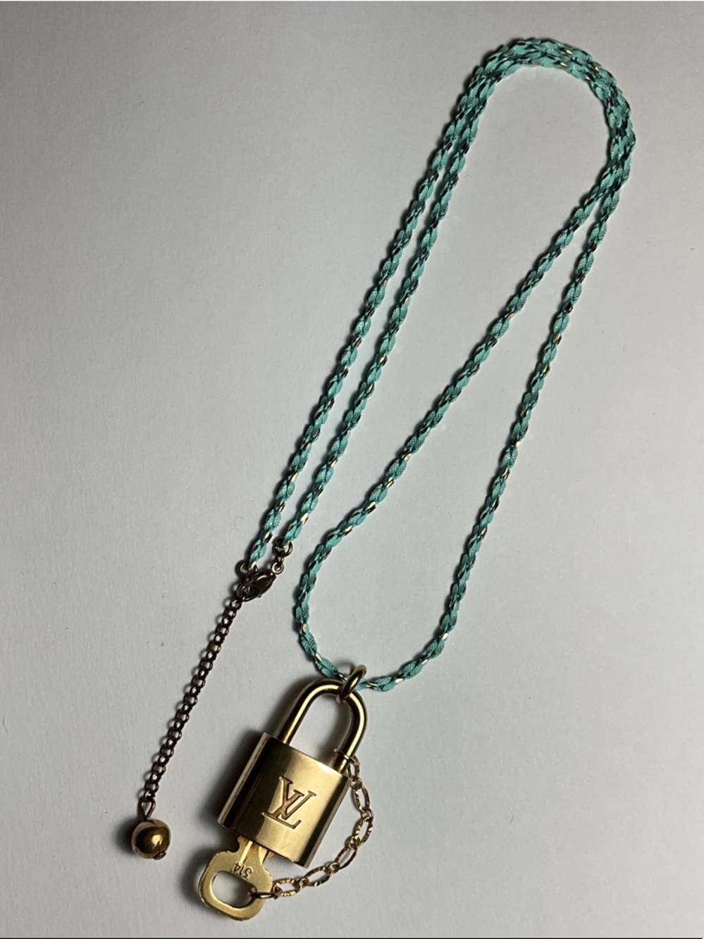 Authentic Louis Vuitton Brass Padlock and Key #314 put on a chain